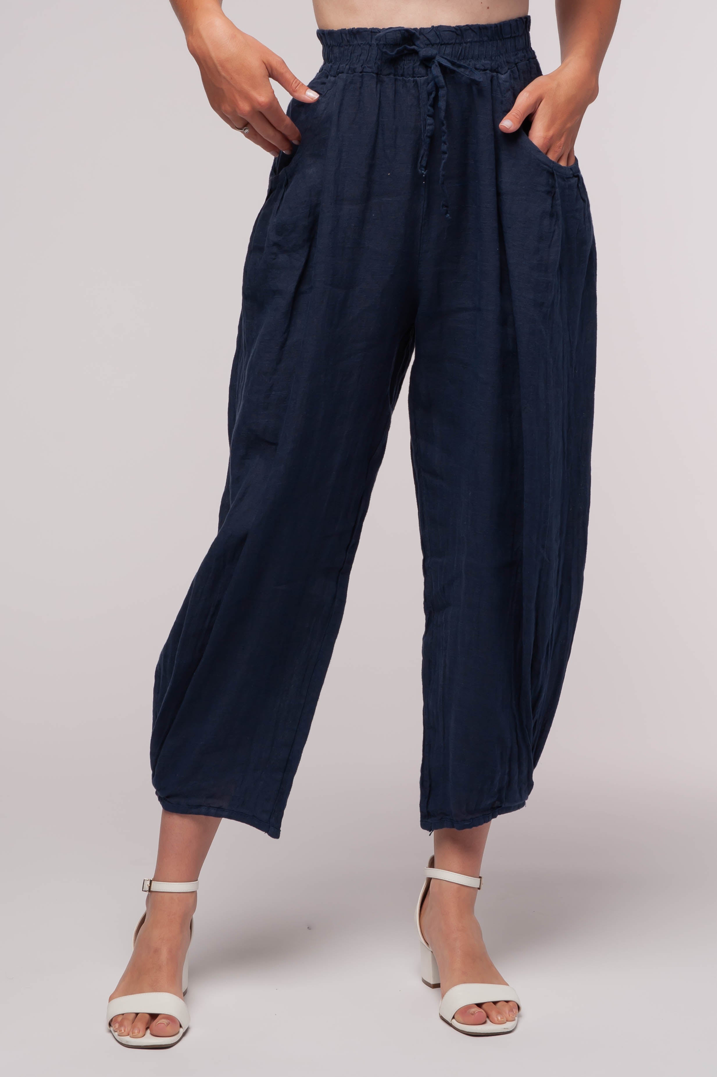 Ladies linen clothing for spring and summer featuring a wide leg pant with elastic waist and pockets.