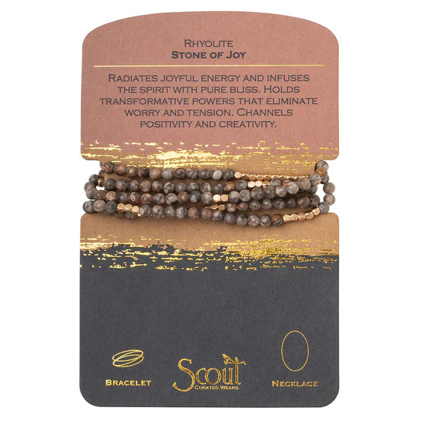 Tap into the energies of the earth. Semi precious gemstones adorn wrist & neckline. Effortlessly converts from bracelet to necklace. Can be wrapped 4-5 times as a bracelet and 1-2 times as a necklace.