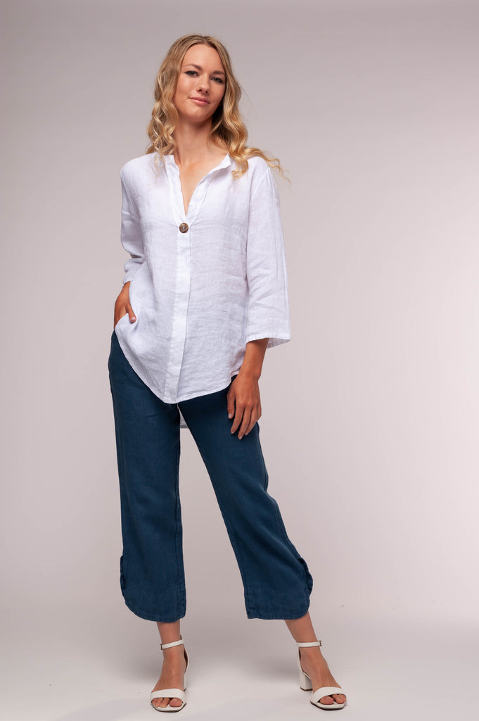   Ladies linen clothing for spring and summer featuring a top with loose long sleeves 