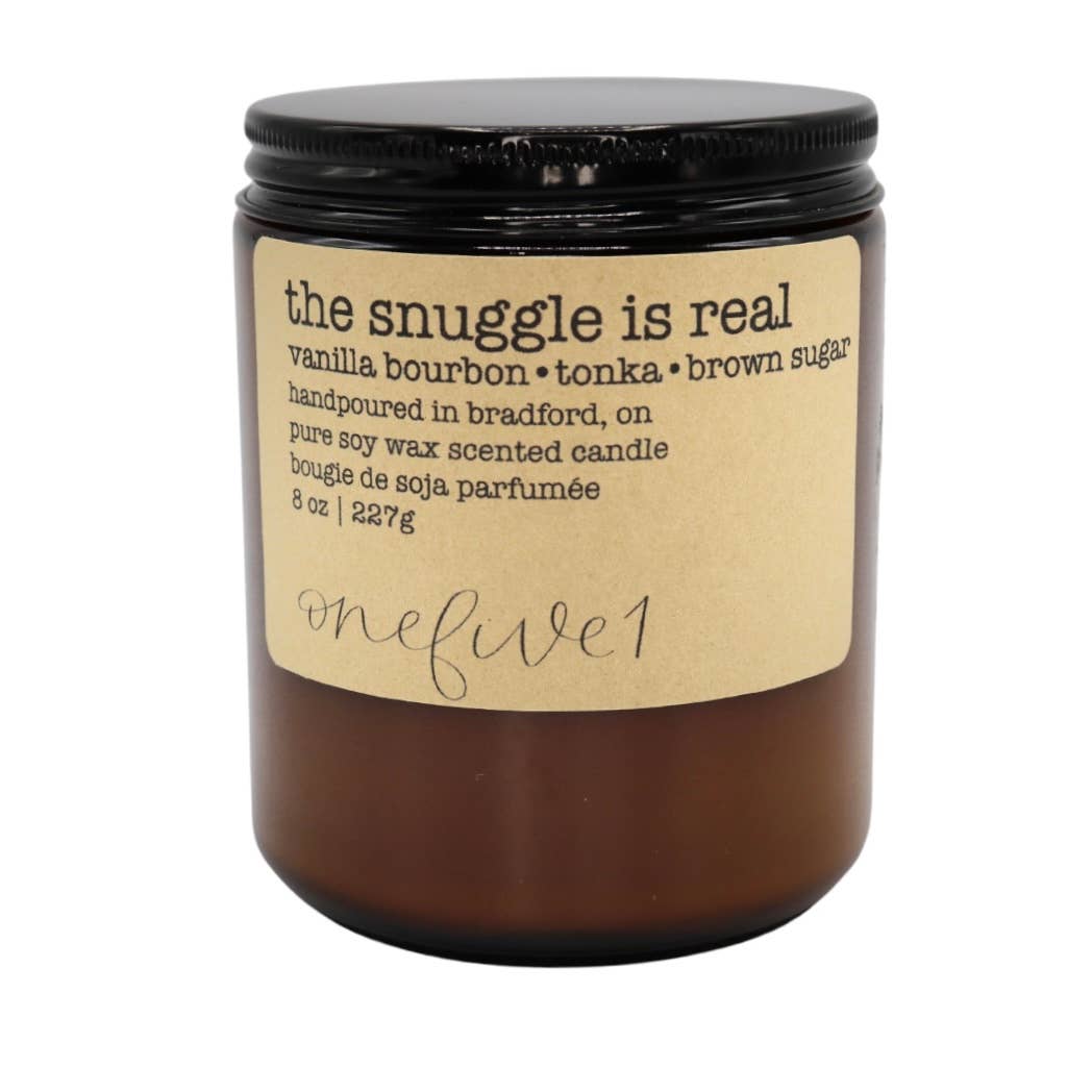 Candle jar with a label on a white background