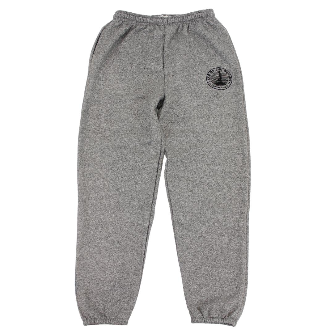 A pair of salt & pepper sweatpants with a Lake of the Woods Clothing Company logo design printed on the top left front leg. These sweatpants are made in Canada and are fit for men and women