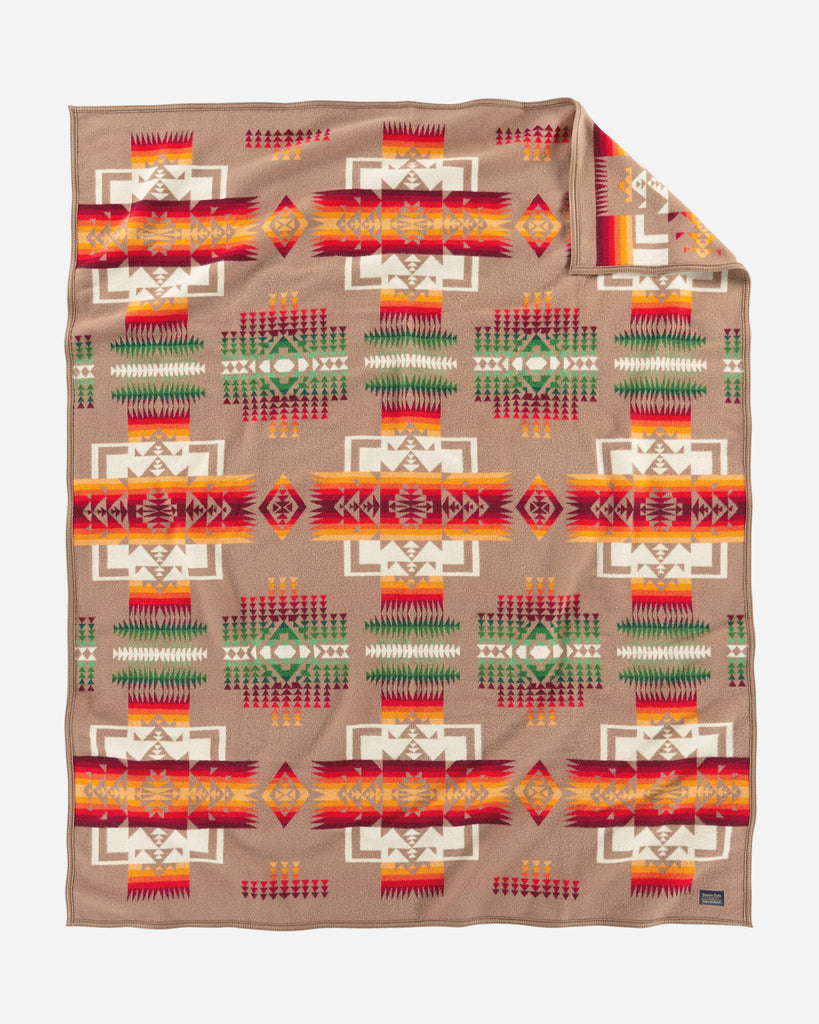 twin size reversible Pendleton wool blanket in khaki with a bold arrowhead design