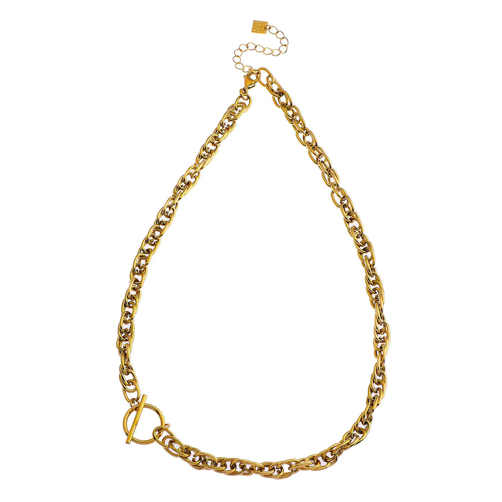 Hackney jewelry featuring a chunky gold intricate multi-chain with circle and T stopper.