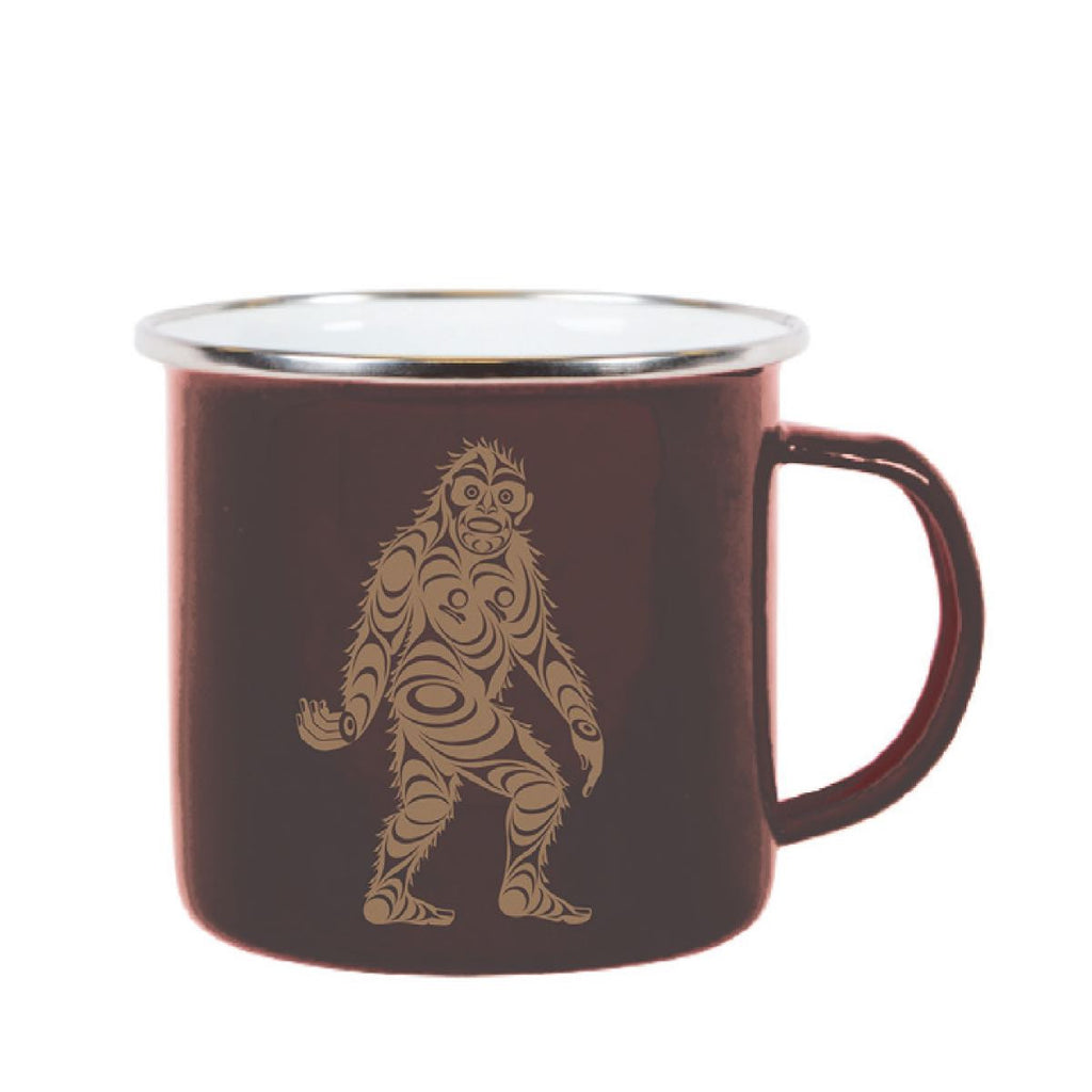 A brown enamel mug featuring a depiction of Sasquatch.