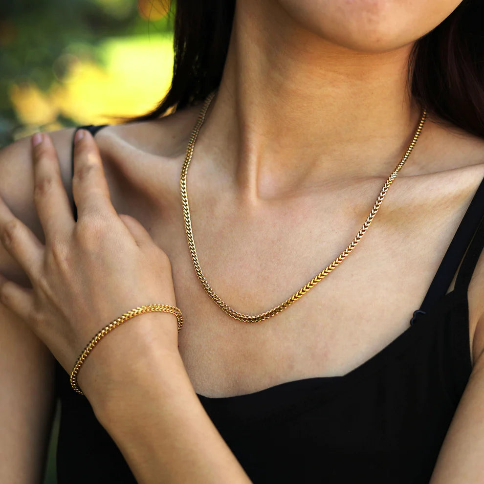 Hackney jewelry featuring a delicate gold paperclip chain bracelet.