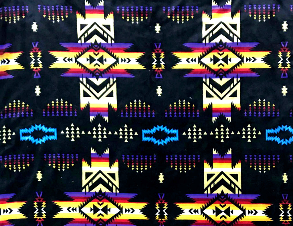 Black reversible to black fleece blanket with traditional native designs. Comes in twin, queen, and king.