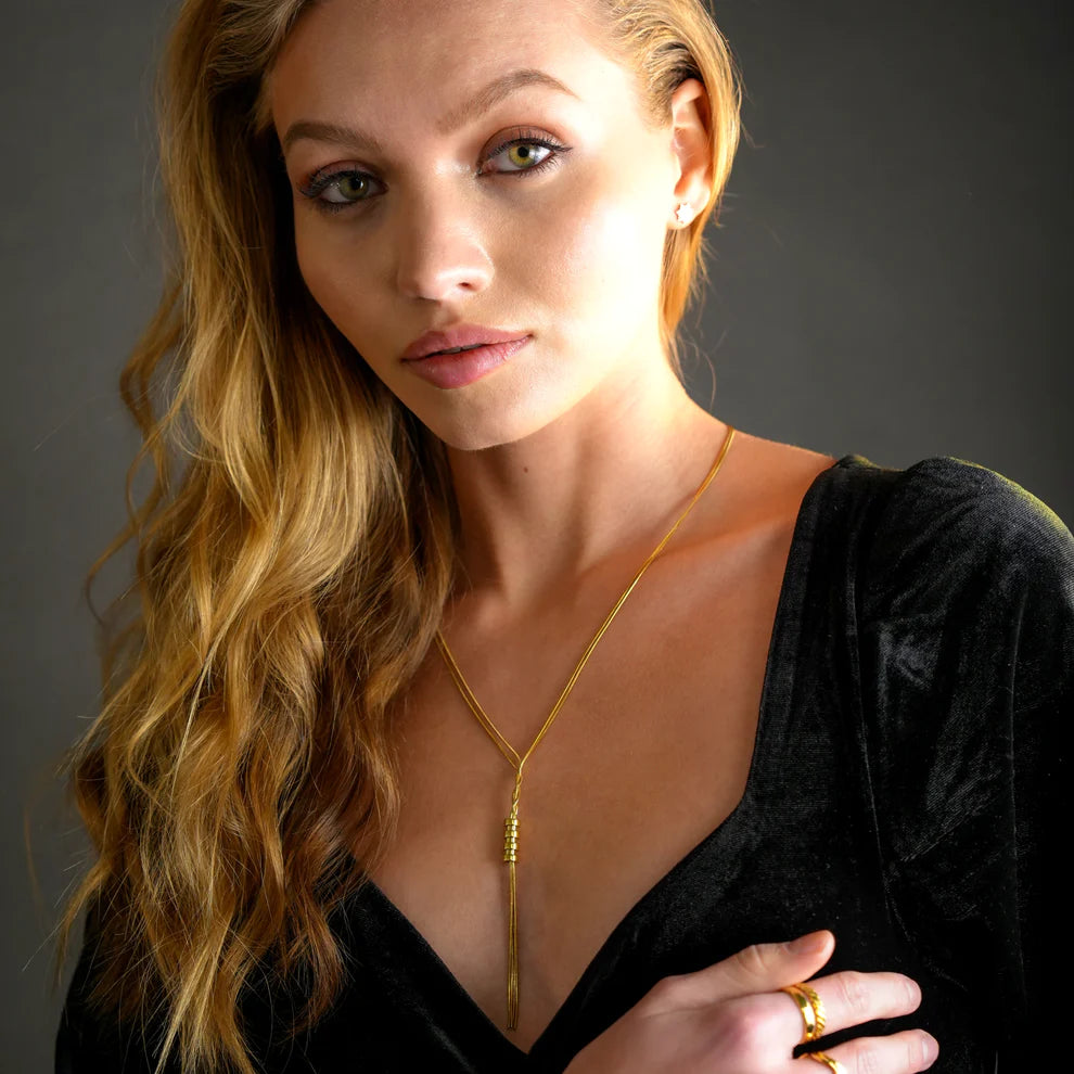 Hackney jewelry featuring a multi stranded gold necklace