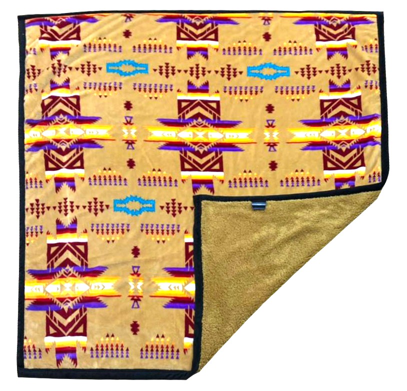 Tan fleece throw blanket with traditional native designs.