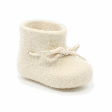 Newborn baby white coloured wool glerup slipper with lace to tie into a bow. 