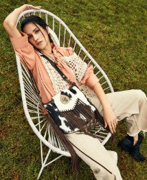 Western Wear is in: Cowboy Boots, Leather Purses & Festival-Ready Fashion