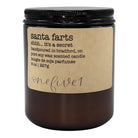Candle with a label reading 'Santa Farts' on a white background