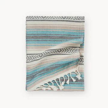 The Coastline towel is an easy choice with its vintage-inspired design with vibrant color story for anyone and everyone you know! Extra-soft handfeel, no crispiness, gets softer with use. Roll up to fit easily into a travel bag or for yoga. Made with pure Turkish cotton in a fair trade environment.