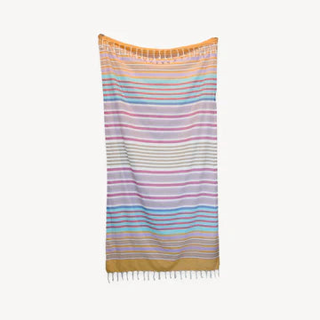 This pure turkish cotton towel is middle-weight and super absorbent to dry off beach or poolside. Folds compactly in your suitcase, ready for any destination. This towel measures larger than the typical towel. Use as a light throw, cover-up, and picnic blanket!