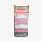 This pure turkish cotton towel is middle-weight and super absorbent to dry off beach or poolside. Folds compactly in your suitcase, ready for any destination. This towel measures larger than the typical towel. Use as a light throw, cover-up, and picnic blanket!