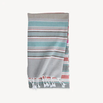 This pure turkish cotton towel is middle-weight and super absorbent to dry off beach or poolside. Folds compactly in your suitcase, ready for any destination. This towel measures larger than the typical towel. Use as a light throw, cover-up, and picnic blanket!