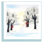 This blank card is perfect for the holiday season or winters handcrafted with a snow-covered path with trees along each side with two red ribbons around the trunks on tree on each side alongwith sun setting in the backside