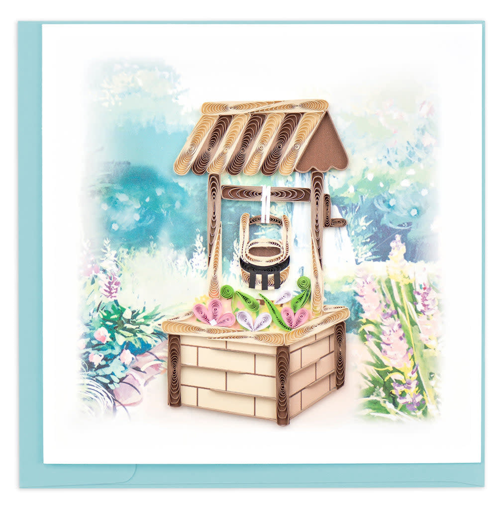 Greeting card to make someone's wish come true! handcrafted traditional stone and wood wishing well in a beautiful garden with flowers also blooming from inside the well.
