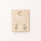 Scout jewelry featuring a pair of stud earrings