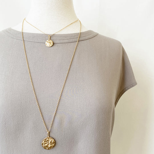 Caracol jewelry featuring a double chain with pendant necklace