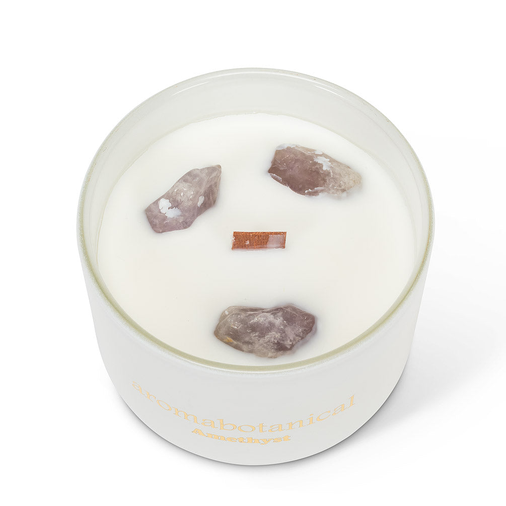 Amethyst scented candle with crystal rocks, burn the candle to receive the crystal. 