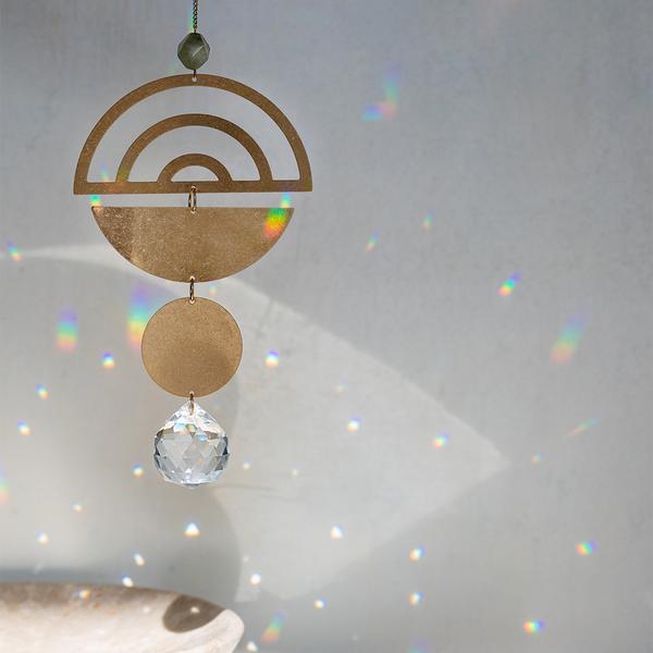 Scout suncatcher used to capture sunlight and transform a room