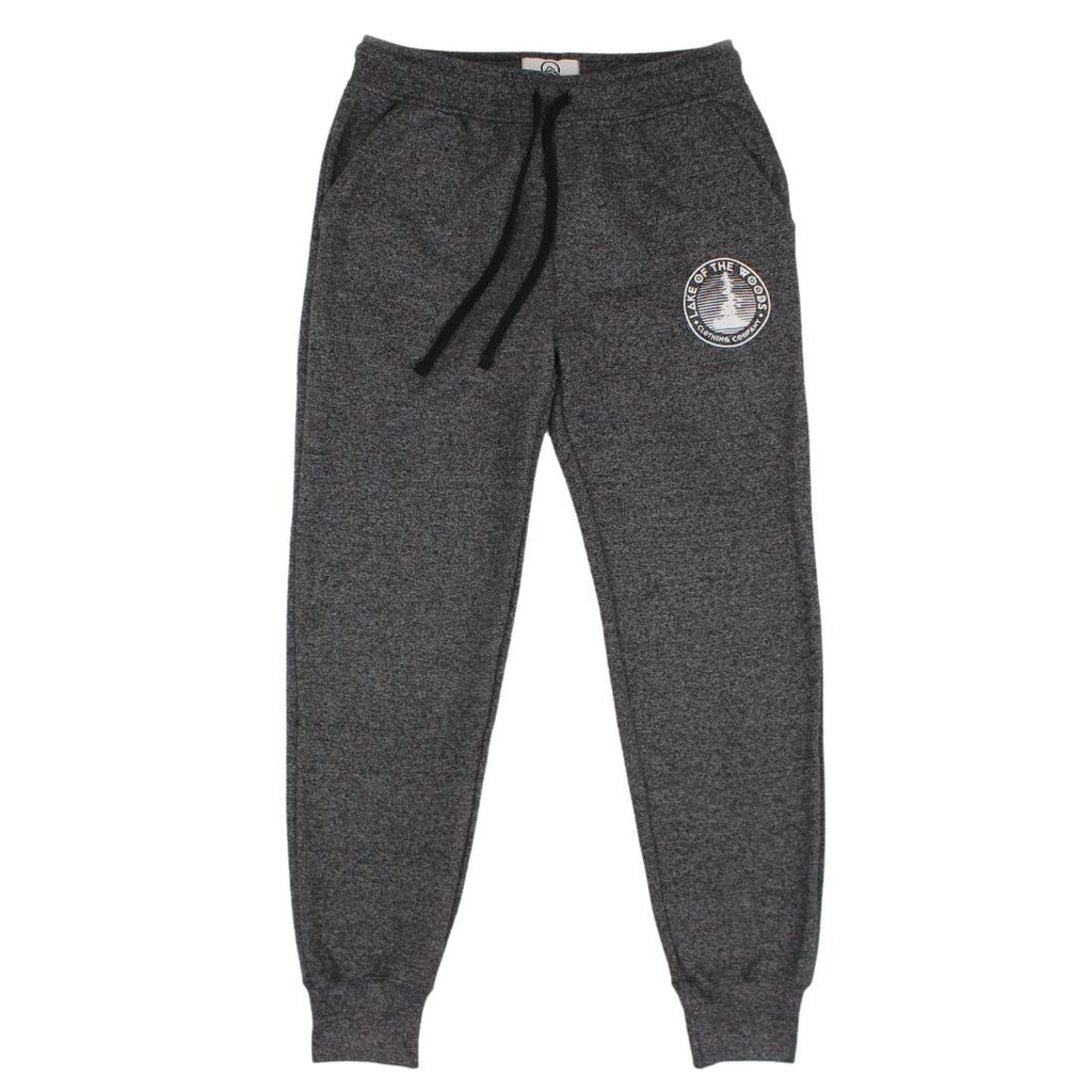 A pair of dark grey sweatpants with a Lake of the Woods Clothing Company logo design printed on the top left front leg. These sweatpants are made in Canada and are fit for women