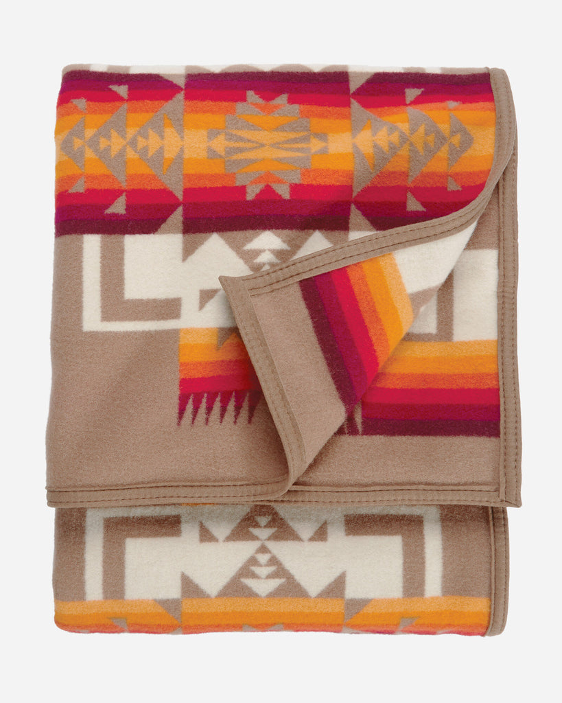 twin size reversible Pendleton wool blanket in khaki with a bold arrowhead design