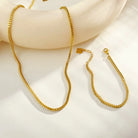 Hackney jewelry featuring a delicate gold paperclip chain bracelet.