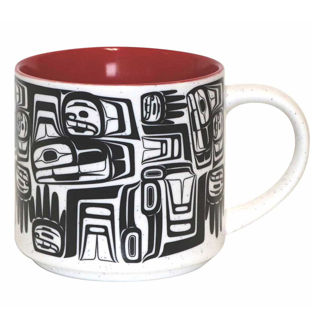 A ceramic coffee mug featuring an Indigenous design of eagles from the Bella Bella tribe.