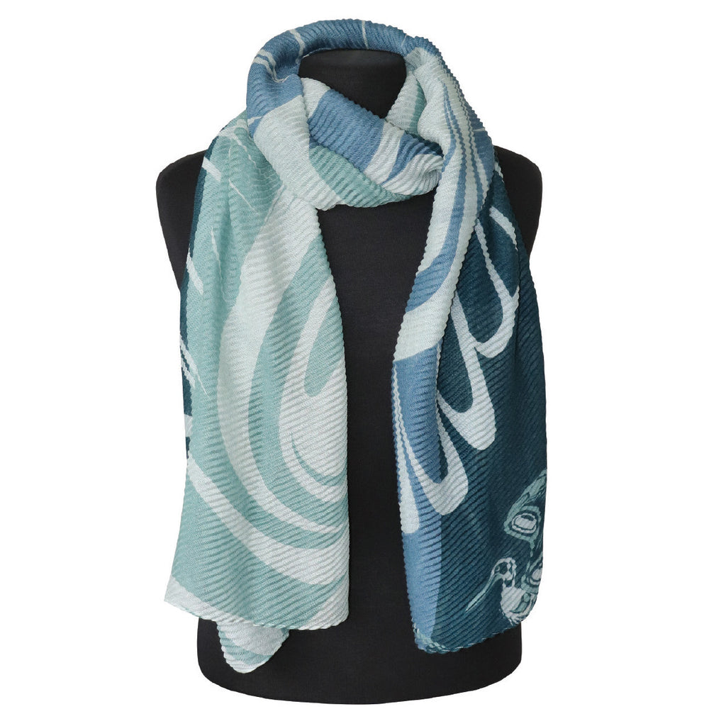 The eco scarf is soft, textured, and vibrantly coloured with an Indigenous design. The perfect way to showcase your style. 