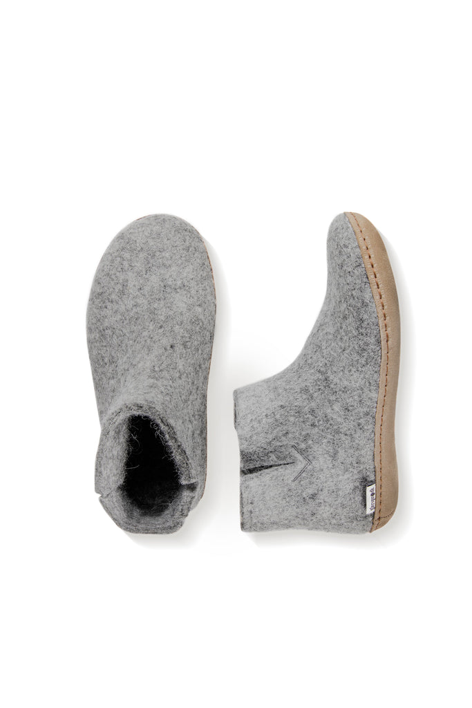 Grey coloured wool glerup boot with leather bottom