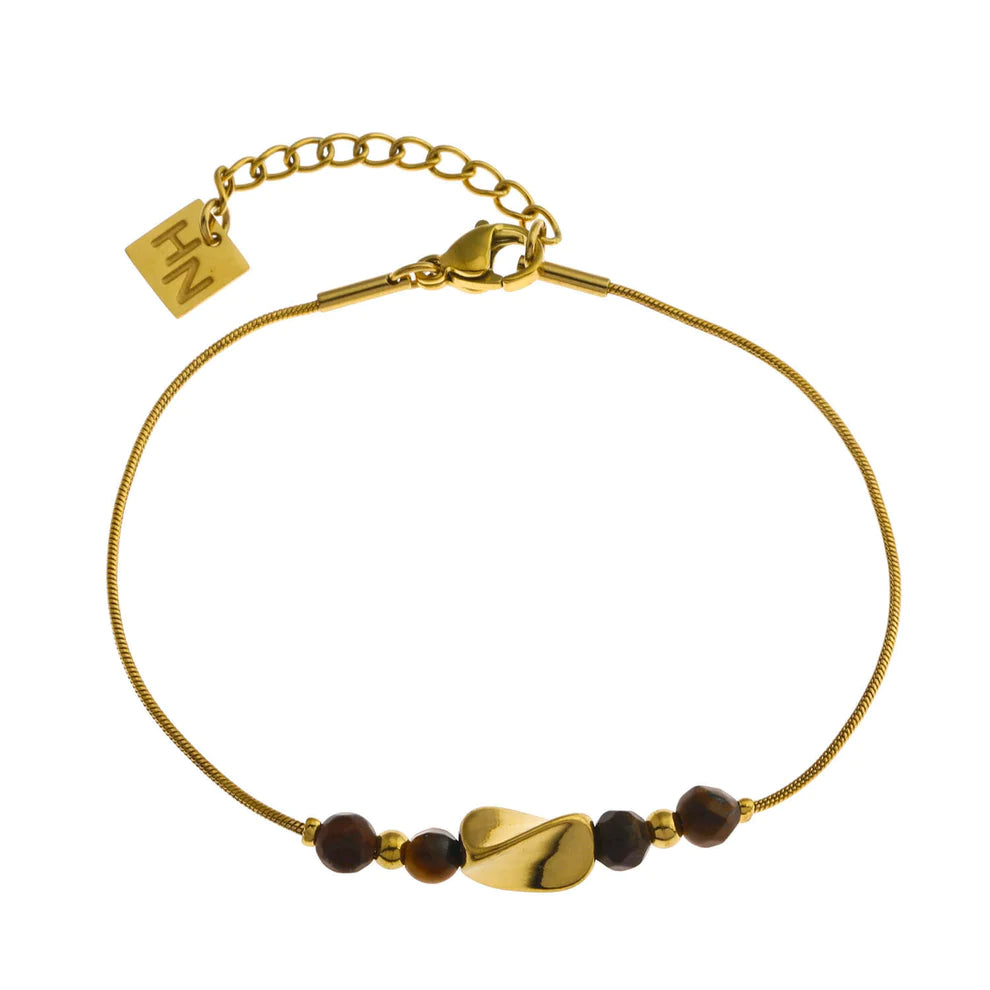 Hackney jewelry featuring a snake skin textured bracelet with gold tiger eye stone charms. 