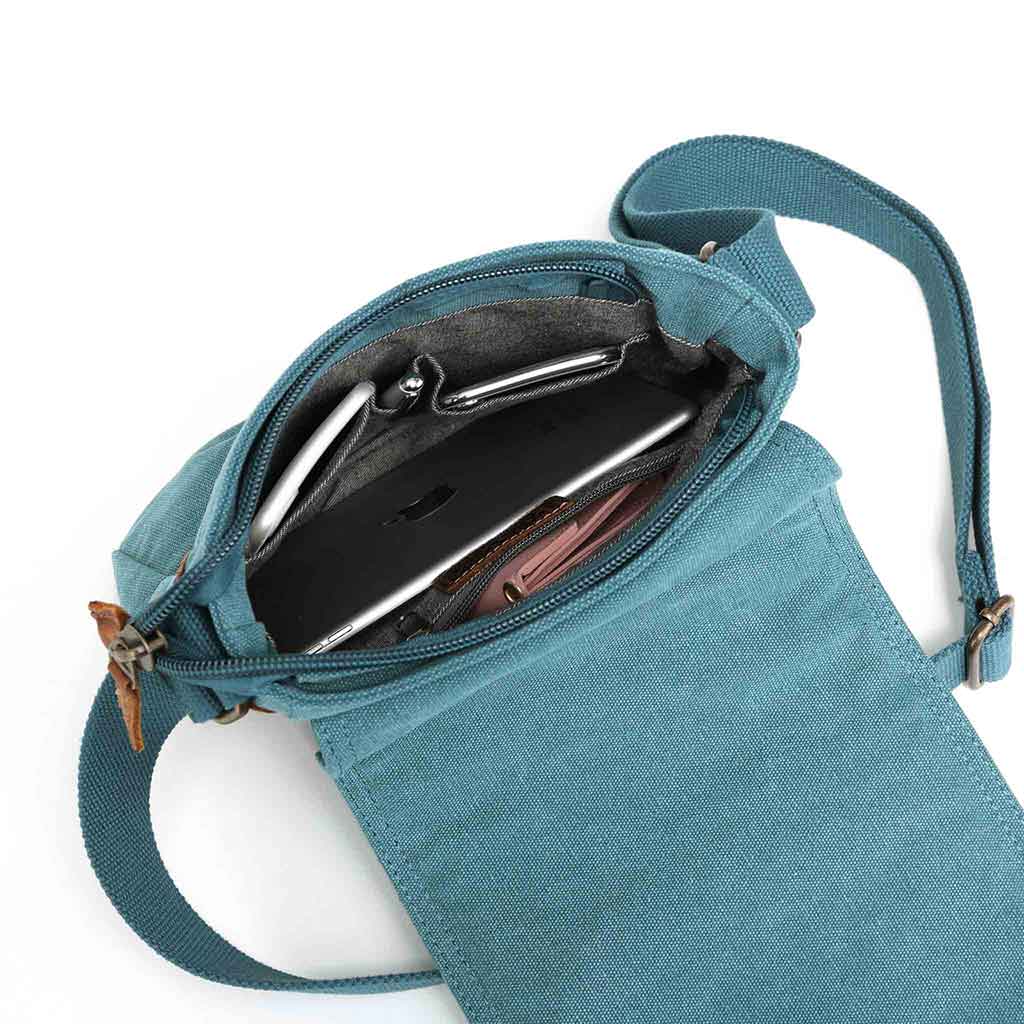 Canvas bag by Davan featuring a water repellent lightweight seven zippered pocket bag