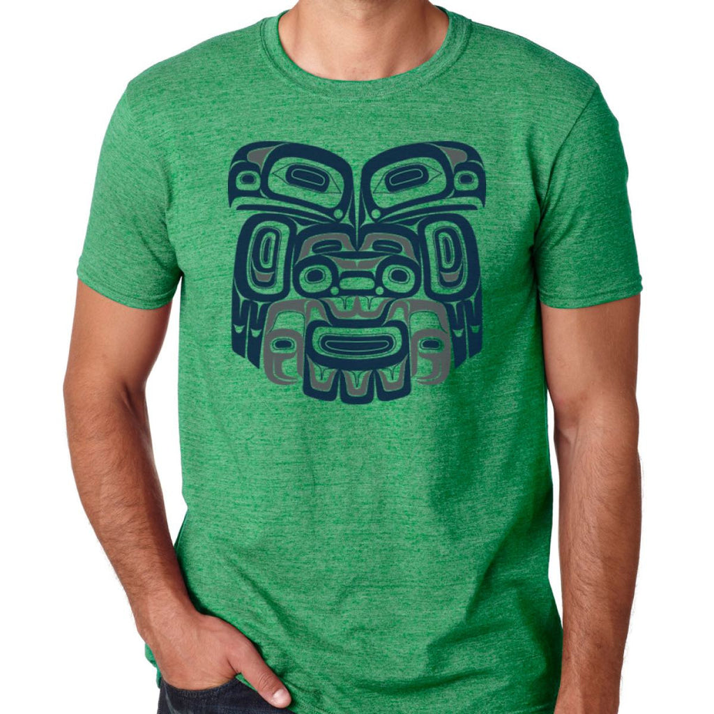 A bright green T-shirt featuring an Indigenous design of two eagles.