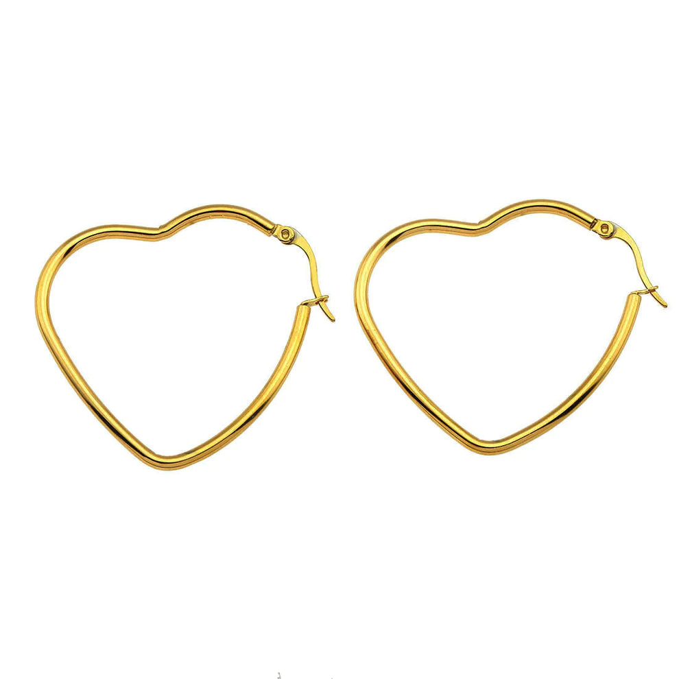 Hackney jewelry featuring a pair of gold heart hoop earrings.