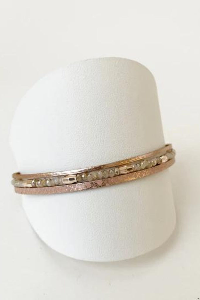 Caracol jewelry featuring a single strand bracelet