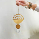 Scout suncatcher used to capture sunlight and transform a room