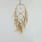Generations Dream Catcher are detailed with semi-precious stones and a quartz crystal in the middle of the web. The top ring is 4", the middle is 2.5" and the smallest is 1.5". Ideal for a child's room wall decor.