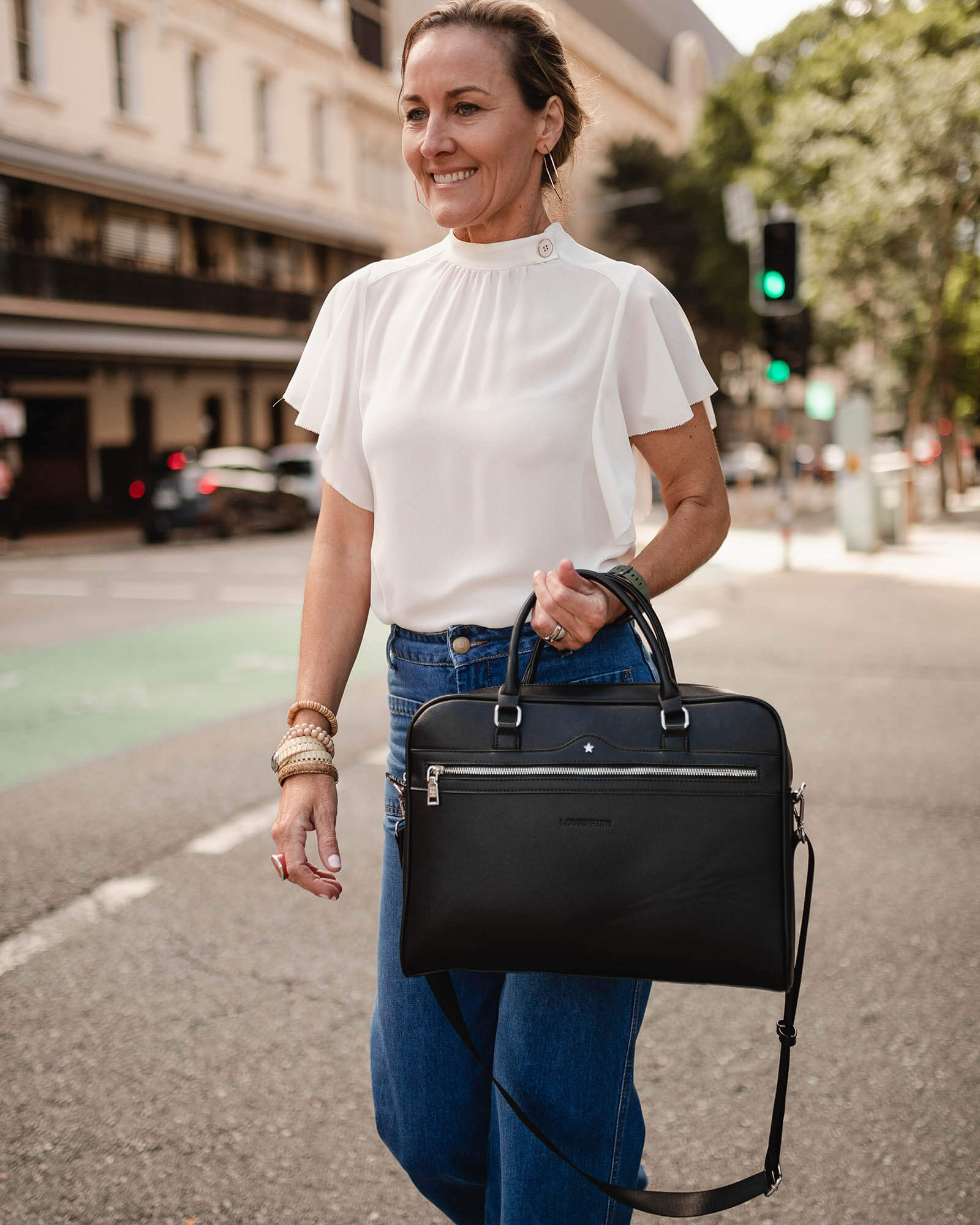 Polyurethane Vegan Leather Louenhide bag featuring a Portland laptop bag